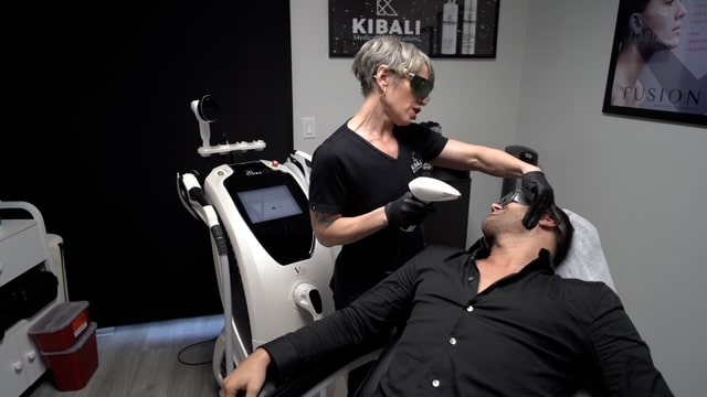 Woman receiving professional anti-aging facial treatment at Kibali Med Spa in Boca Raton
